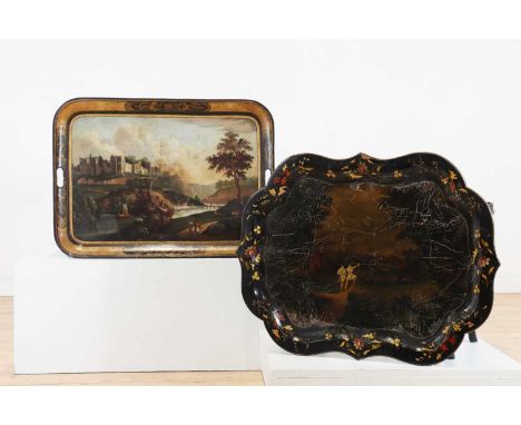 Two ebonised tray-top side tables, 19th century and later, a toleware example painted with a castle, the other papier mâché, 