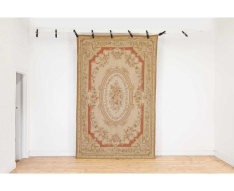 A needlepoint wool carpet of Aubusson design,of recent manufacture,269 x 174cm