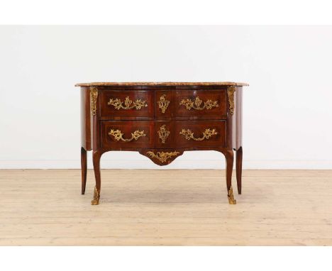 A Transitional rosewood and tulipwood crossbanded commode, c.1770, French, of serpentine outline, the brèche d'Alep marble to