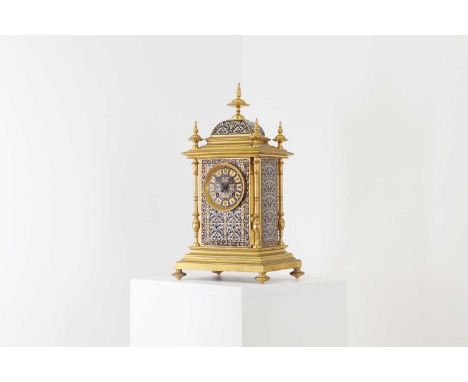 A late Victorian brass and enamel mantel clock,retailed by 'Whytock &amp; Sons, Dundee, Paris', the domed case with panels of