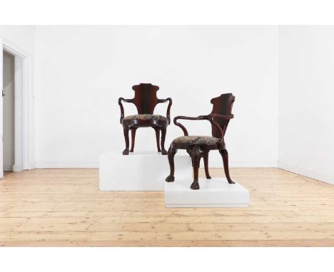 A pair of Queen Anne-style mahogany armchairs attributed to Gillows, late 19th century, each with a shield back and shepherd'