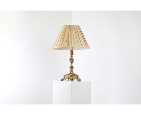 A Louis XV-style ormolu candlestick lamp,second half of the 19th century, with scrolling rococo decoration, with a silk pleat