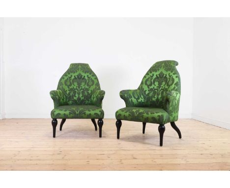 A pair of upholstered armchairs, of recent manufacture, each with a high buttoned back and turned ebonised supports, covered 