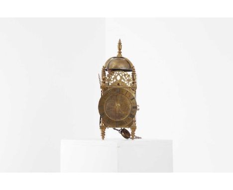 A brass lantern clock,18th century, by Peter Carson, near London Bridge, the bell under a cross frame above pierced dolphin m