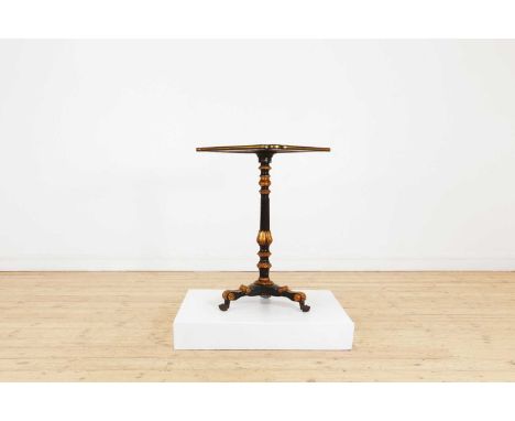 An ebonised and parcel-gilt occasional table,19th century, Italian, with a painted faux specimen marble top above a turned co