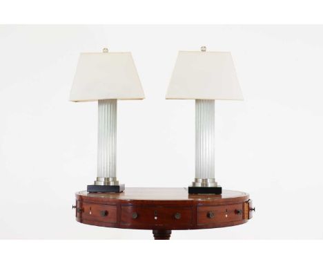 A pair of metal column table lamps,of recent manufacture, each on a square base, with a square shade,21cm wide21cm deep66cm h