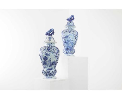 A pair of tin-glazed earthenware vases and covers,late 19th/early 20th century, Dutch, Delft, each painted in underglaze blue