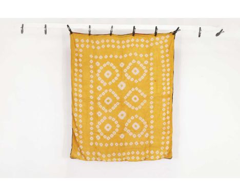 A plangi silk textile,20th century, Uzbekistani, Tashkent, with a simple repeating tie-dyed pattern on a yellow ground, backe