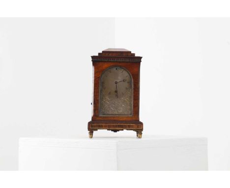 A small George IV rosewood library clock by Vulliamy of London,c.1830, the brass-mounted case with a stepped pediment, chamfe