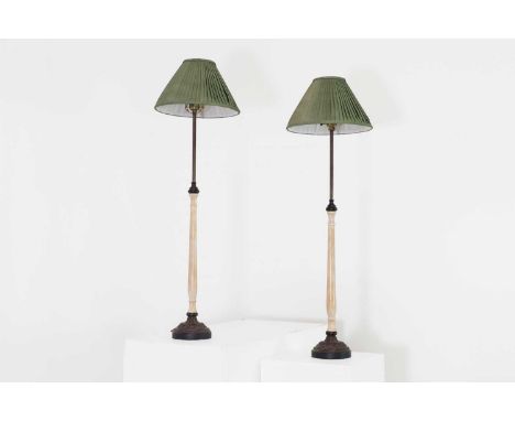 A pair of faux marble and embossed metal table lamps,of recent manufacture, each with a slender column and foliate-decorated 