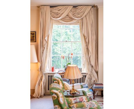 Three pairs of silk curtains,late 20th century, each with a swag waterfall valance,each curtain 293cm long132cm wideswags 190