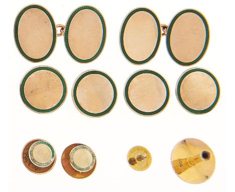 A gold and green guilloche enamel bordered gentleman's dress set, second quarter 20th c, of cufflinks, buttons and studs, cuf