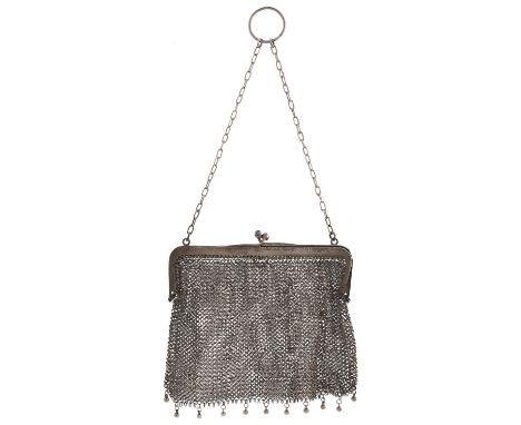 A silver and mail evening bag, with chains and finger ring, frame 12cm l, import marked London 1911, 3ozs 13dwts  Frame bent