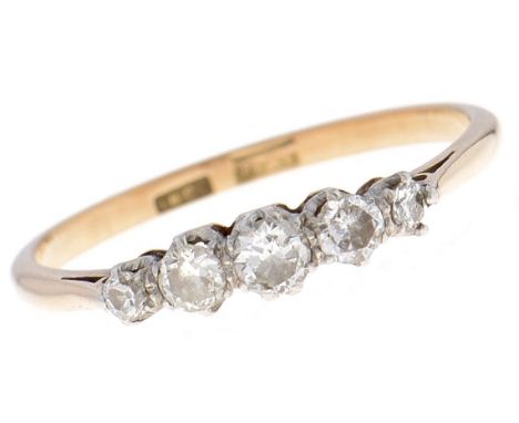 A five stone diamond ring, that to the centre weighing approximately 0.15ct, gold hoop marked 18ct PLAT, 2.7g, size V  Good c