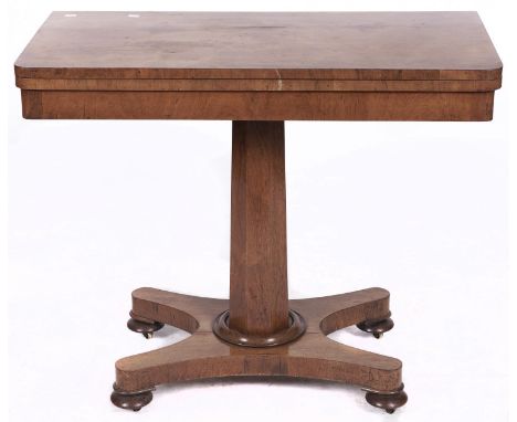 An early Victorian rosewood card table, on octagonal pillar, platform and bun feet, 91.5cm l  Top watermarked and scratched, 