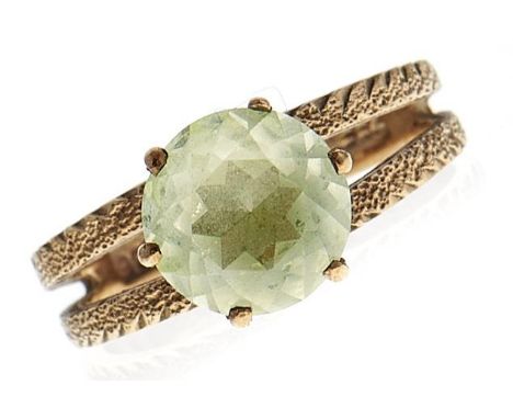 A green stone ring, in gold marked 9ct, 3.2g, size M  Light wear