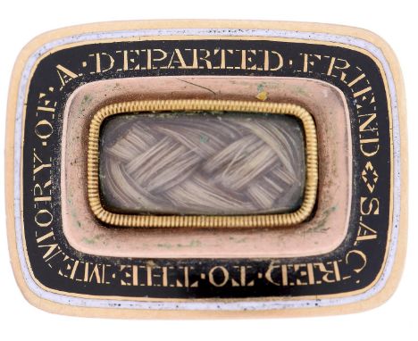 A Regency gold and enamel mourning brooch, 1810,&nbsp; inset with plaited hair and inscribed SACRED TO THE MEMORY OF A DEPART