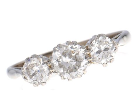 A three stone diamond ring,&nbsp;with old cut diamonds that to the centre weighing approx 0.5ct, in white gold marked 18ct 2.