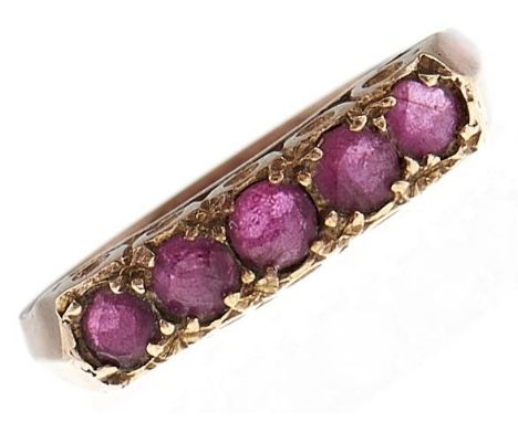 A five stone ruby ring, in 9ct gold, 2.5g, size O  Good condition