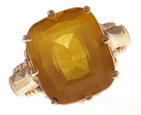 A Portuguese yellow sapphire ring, in gold, maker's mark, control mark for 18ct, 7.5g, size N  Good condition