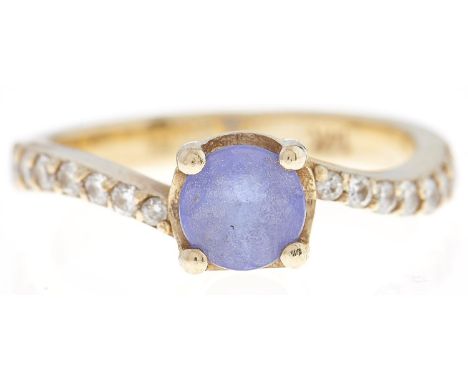 A tanzanite&nbsp; and diamond ring,&nbsp;in gold marked 14k, 3.9g, size O  Good condition