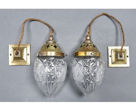 A pair of early electric brass corridor light pendants, Holophane Co, early 20th c, with moulded glass shade, 17cm h excludin