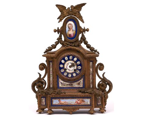 A French giltmetal and Sevres style porcelain inset mantel clock, late 19th c, in Louis XVI style, the breakarched case surmo