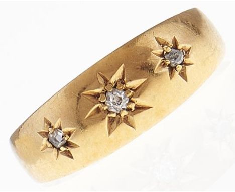 An Edwardian three stone diamond ring, gypsy set in 18ct gold, Chester, date letter rubbed, 2.1g, size I  Slight wear