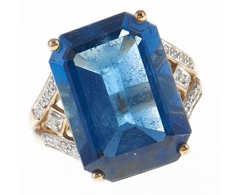 A blue topaz cocktail ring, with diamond shoulders, in gold marked 375, 8.3g, size M  Good condition