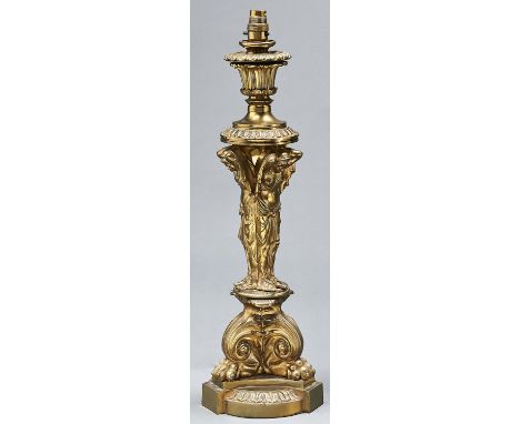 A Victorian brass lamp, 19th c,&nbsp;adapted,&nbsp;53cm h  Converted to electricity; lacking one of the leaf scrolls immediat