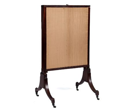 A George III mahogany firescreen, c1800,&nbsp;with ebonised stringing, the rectangular mahogany frame with pull out sides and