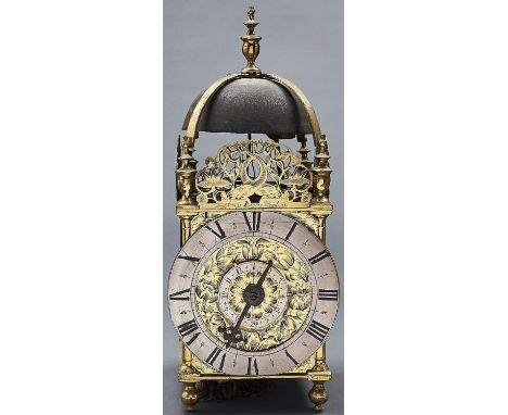 A brass lantern clock, Thomas Bagley, Londini, c1670, the dial engraved with tulips, silvered alarm disc and chapter ring, tw