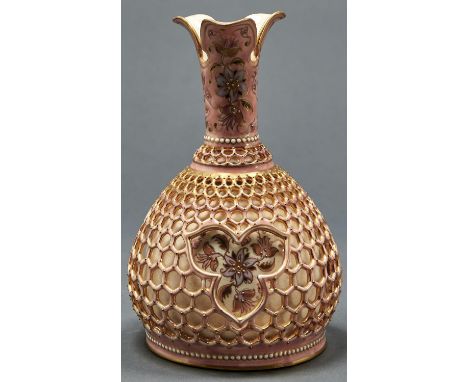 A Zsolnay honeycomb reticulated, double walled vase, designed by Tade Sikorski, c1888, decorated with flowers, the triple lip