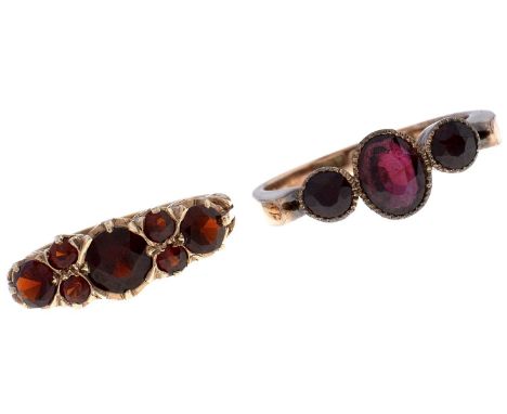 A Victorian three stone garnet ring,&nbsp;c1900,&nbsp;in gold marked 9ct and a garnet ring in 9ct gold, London 1975, 6.2g, si