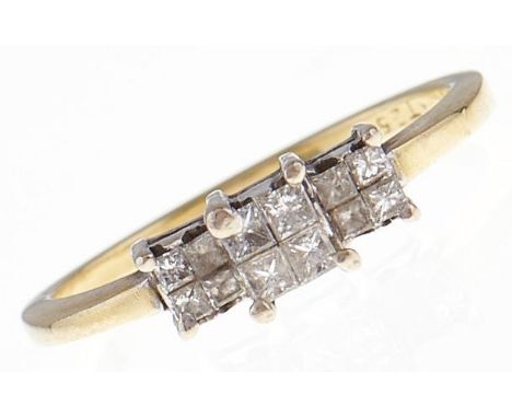 A twelve stone diamond ring with princess cut diamonds, in 18ct gold, 2.9g, size M  Good condition