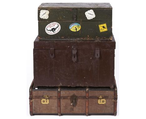 A rectangular wooden bound fabric covered trunk, applied lacquered brass clasps, lock plates with side carrying handles, 90cm