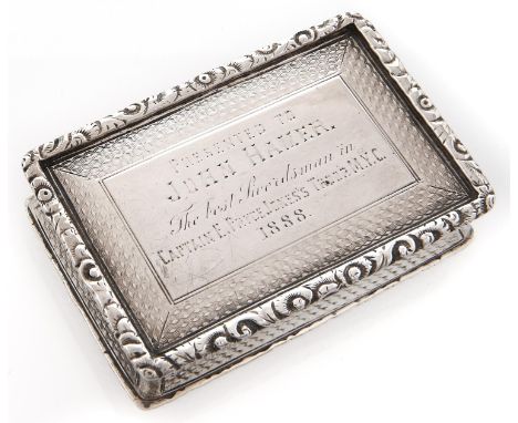 A Victorian silver snuff box, with waisted sides and chased rim, the lid engraved with contemporary inscription, 68mm l, by G