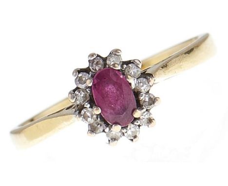 A ruby and diamond cluster ring, in 18ct gold, 2.6g, size M  Good condition