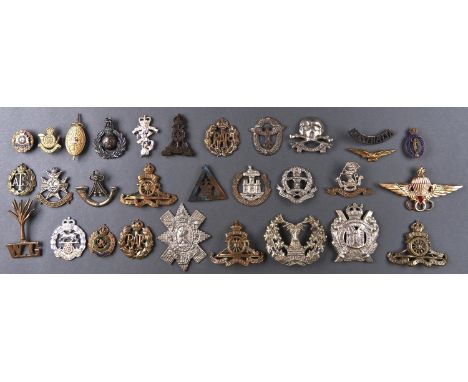 Miscellaneous British army cap badges and other insignia, including RAF, triangular War Service badge, etc (30)  