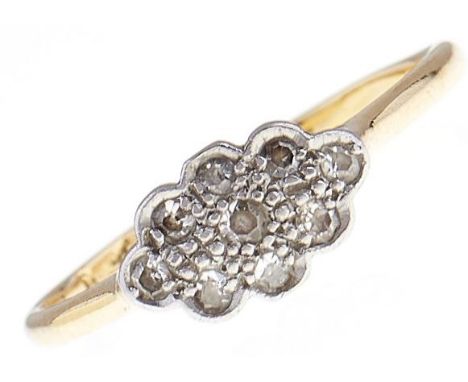 A diamond cluster ring, in gold marked 18ct PLAT, worn, 2g, size Q  Wear consistent with age