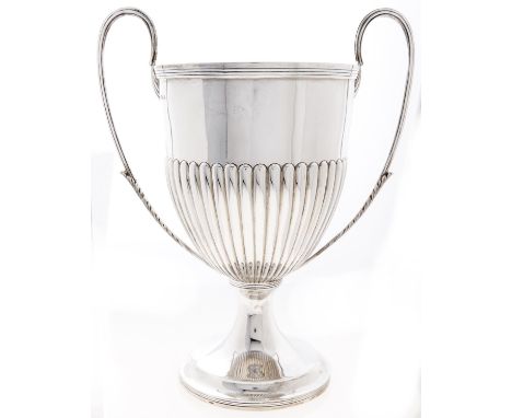 A Victorian silver cup, shield shaped with reeded rim and handles issuing from acanthus leaves, 36cm h, by James Deakin &amp;