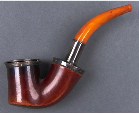 Smoking. A meerschaum tobacco pipe, c1900, plated mounts and amber mouthpiece, bowl 85mm l, plush lined morocco case  Used co