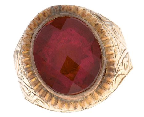 A synthetic ruby ring, engraved and fluted gold band, 6.5g, size K½  Light wear only