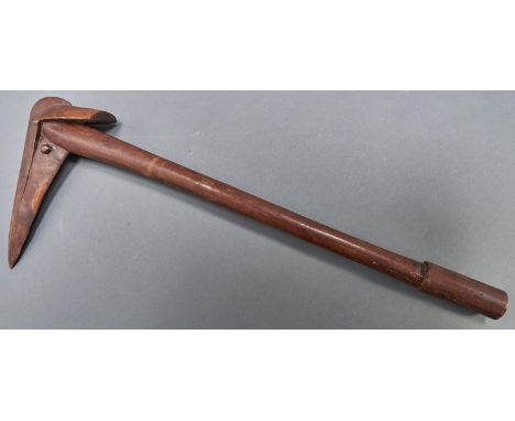 An Oceanic wood ceremonial bird headed club, New Caledonia, first half 20th c, 75cm  In private family ownership for many dec