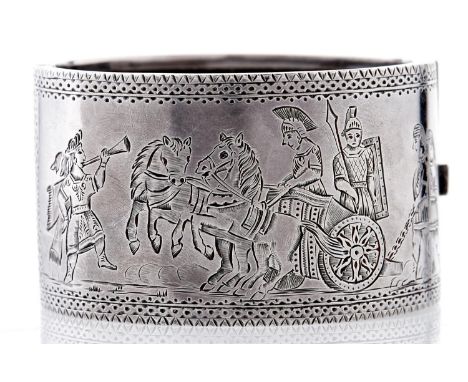 A Victorian silver bangle, c1880, engraved with a charioteer, unmarked  