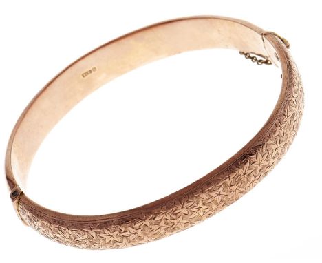A 9ct gold bangle, Chester 1917, 12.4g  Light dents on underside