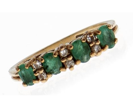 An emerald and white stone ring, in 9ct gold, 2.1g, size L  Good condition