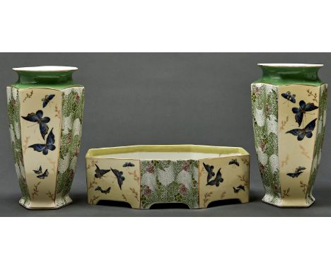 An art nouveau Limoges garniture, Bernardaud factory, early 20th c, of octagonal jardiniere and hexagonal vases, painted with