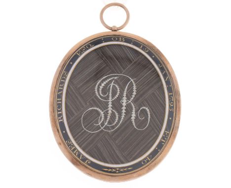 A gold mourning locket, 1795,&nbsp;the glazed obverse with seed pearl initials JR over plaited hair in enamel surround inscri