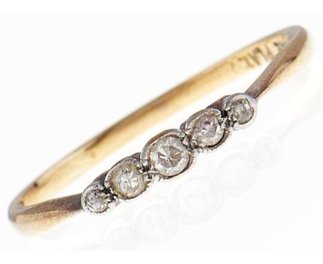 A five stone diamond ring, gold hoop, marked FINE PLAT, 1.6g, size P  Wear consistent with age